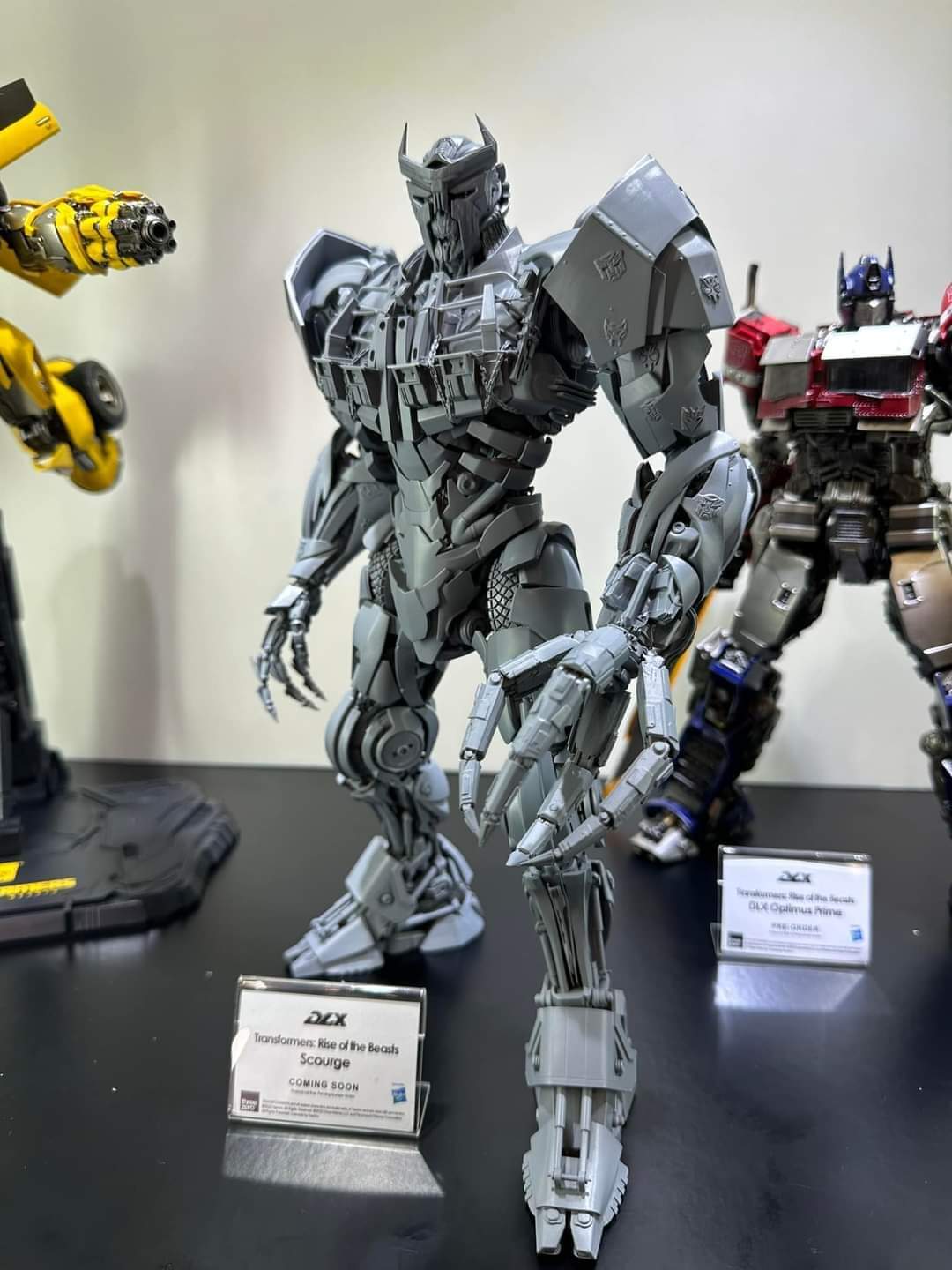 DLX Scourge, Mirage, Optimus Primal First Looks at threezero